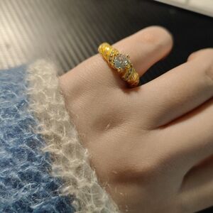 Elegant Gold Ring with Crystal Accent